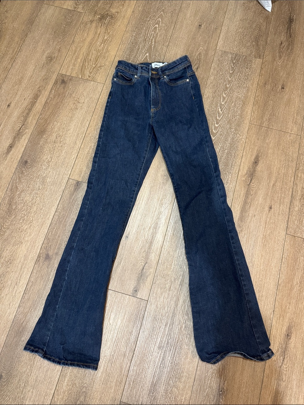 Never worn — ONLY dark blue jean